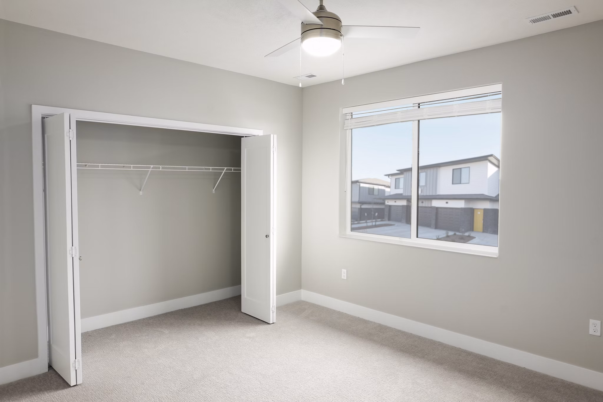 Cozy bedroom with modern furnishings at Allora 168 Apartments