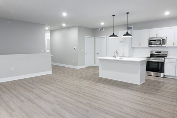 Dining room featuring modern furnishings and elegant lighting at Allora 168 Apartments, a luxury Greystar community