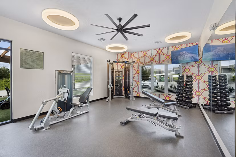 State-of-the-art fitness center with modern equipment at Allora 168 Apartments
