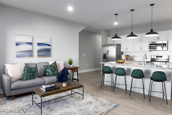 Cozy living room with modern decor at Allora 168 Apartments, showcasing luxury living in a prime location
