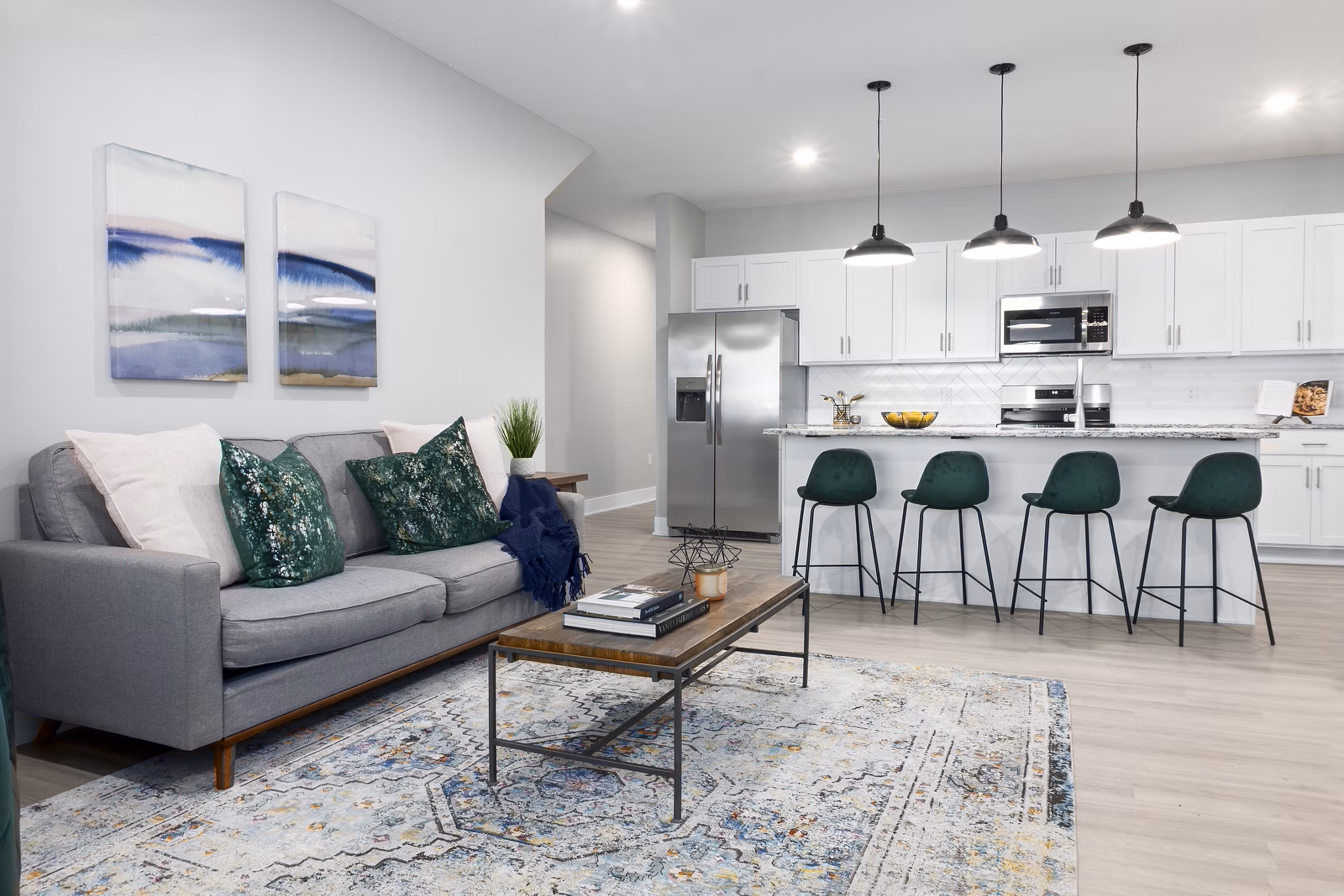 Spacious living room with modern decor in Allora 168 Apartments