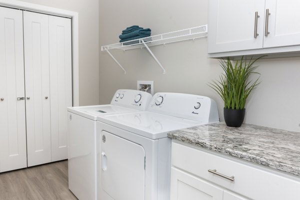 laundry room at Allora 168 Apartments