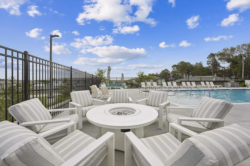 Rooftop pool with lounge chairs at Allora 168 luxury apartments