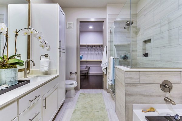 Elegant bathroom with modern fixtures at The Laurel Preston Hollow Apartments, showcasing luxury living in Dallas