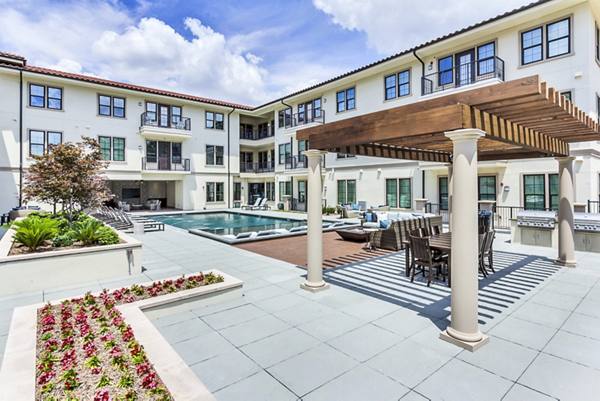 grill area/patio/pool at The Laurel Preston Hollow Apartments