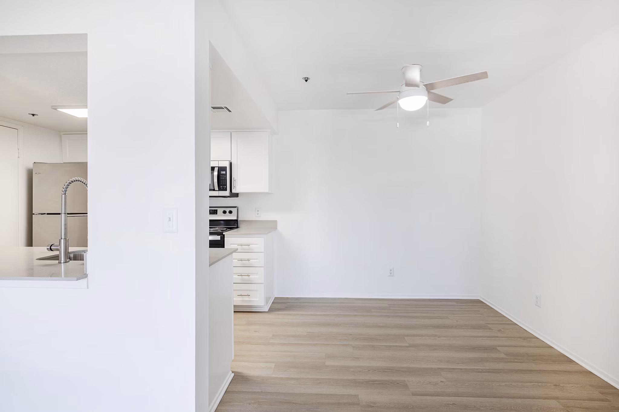 Dining area with contemporary design elements at The Landing Apartments