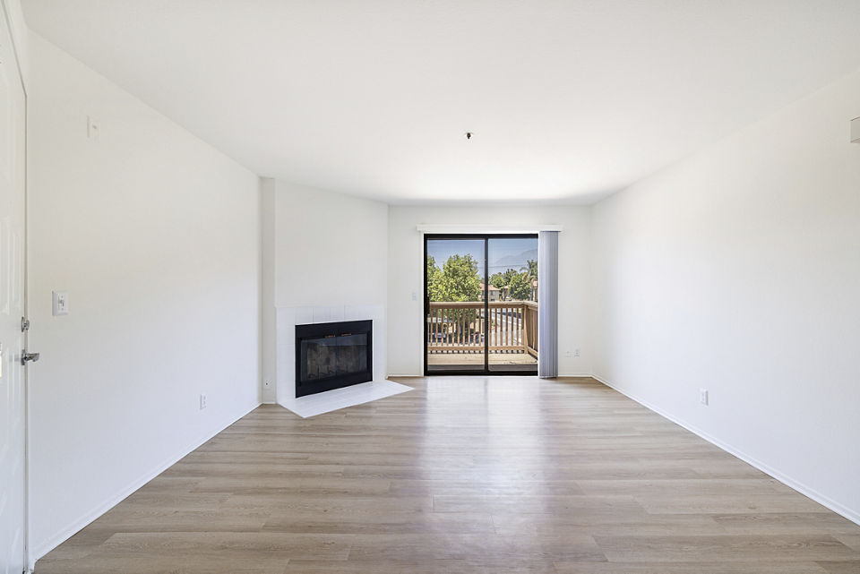Spacious living room with modern decor at The Landing Apartments