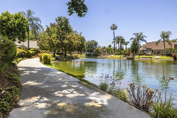 Tranquil courtyard with lush greenery at The Landing Apartments