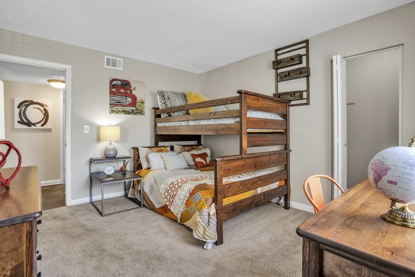 Bedroom featuring stylish decor and modern furnishings at Castilian Apartments, Greystar luxury apartments