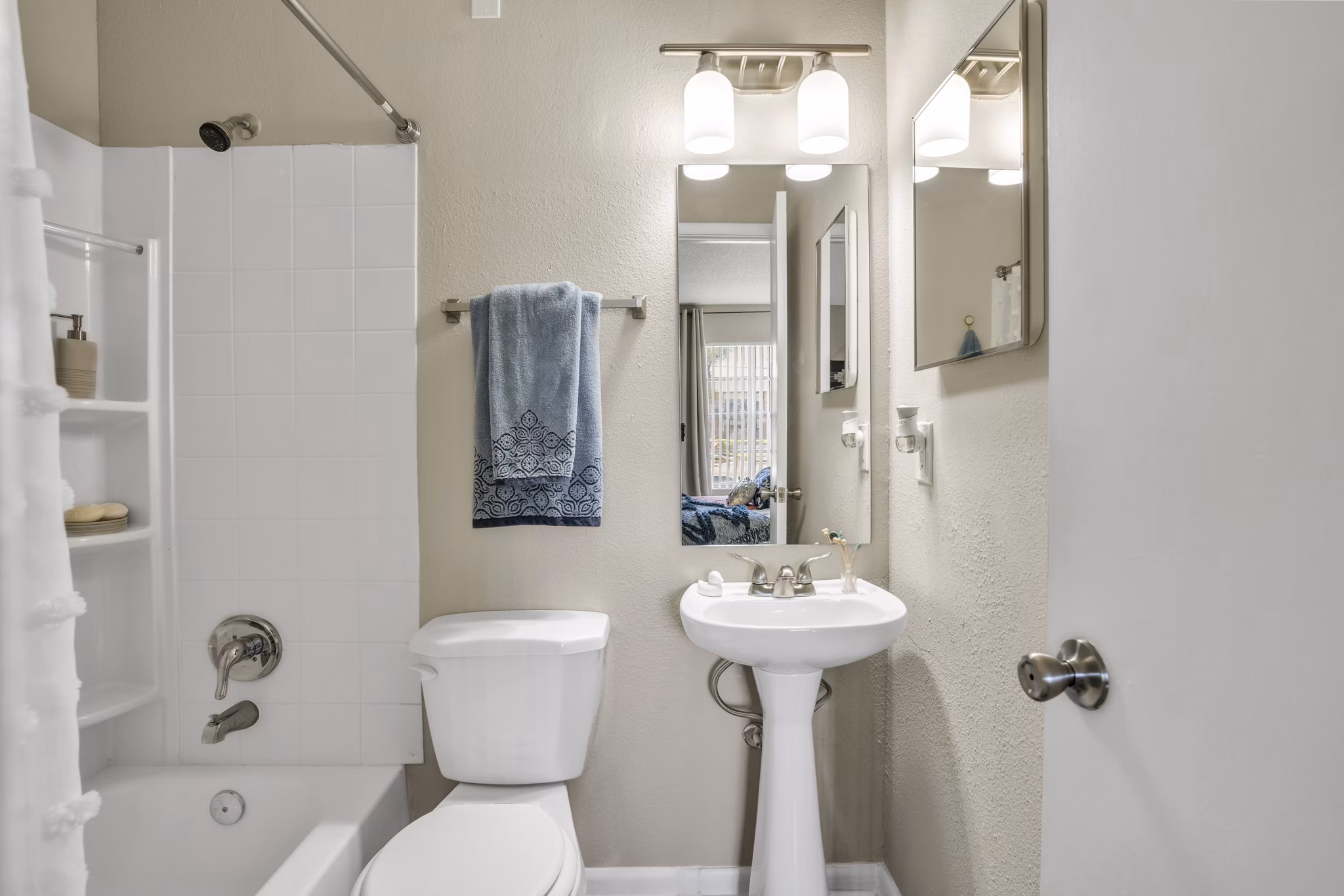 Modern bathroom with elegant fixtures at Castilian Apartments