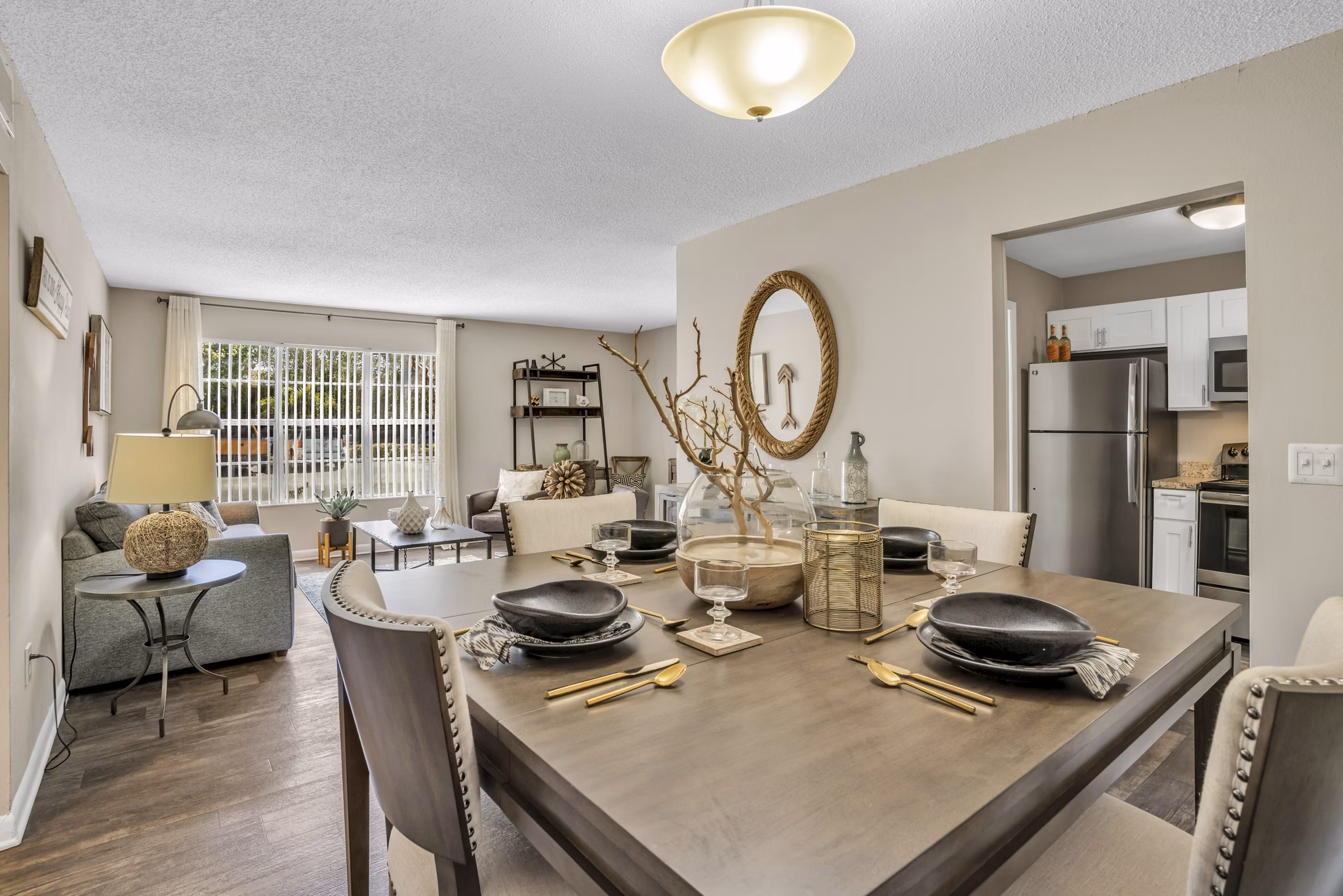 Dining area with modern decor and elegant lighting at Castilian Apartments
