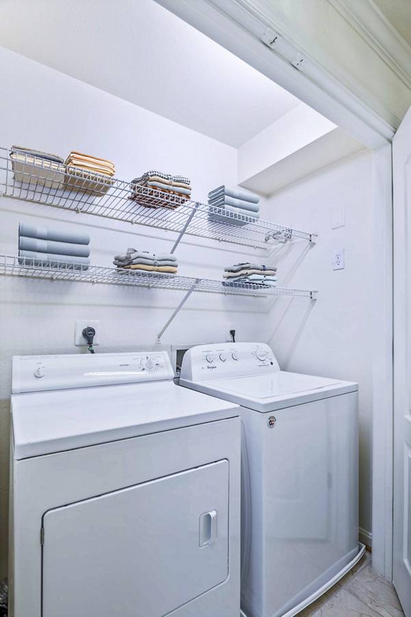 laundry room at The Crossings at Russett Apartments