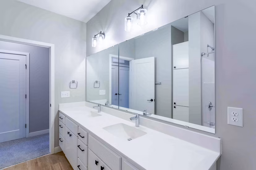 Modern bathroom with elegant fixtures at Summerwell Maple Grove Apartments, offering luxury living spaces