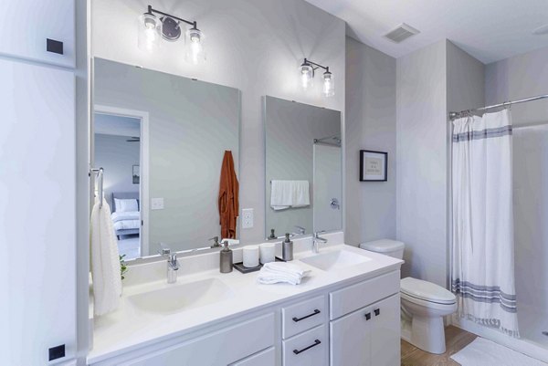 Spacious bathroom with modern fixtures at Summerwell Maple Grove Apartments
