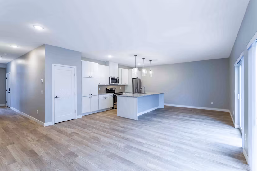 Dining room featuring elegant decor and natural light at Summerwell Maple Grove Apartments