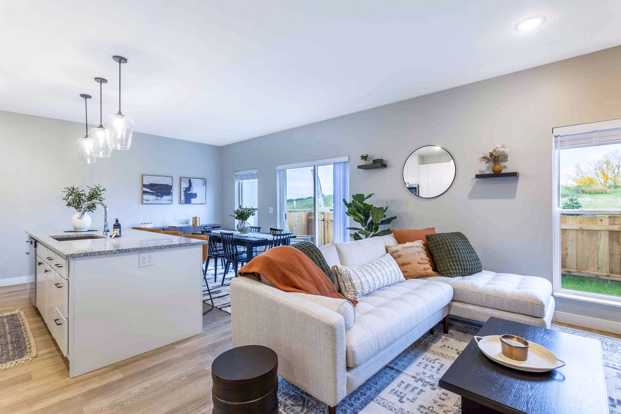 Spacious living room featuring modern decor at Summerwell Maple Grove Apartments, perfect for luxury living