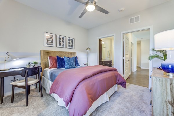 bedroom at Cascades at Onion Creek Apartments