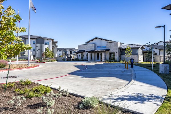 clubhouse/leasing office at Cascades at Onion Creek Apartments