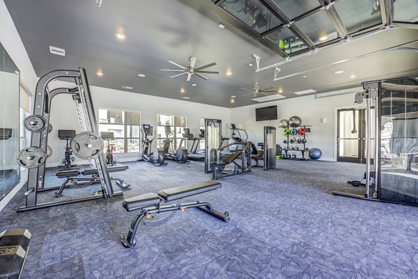 fitness center at Cascades at Onion Creek Apartments