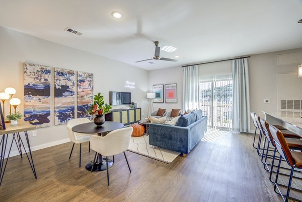 dining and living room at Cascades at Onion Creek Apartments