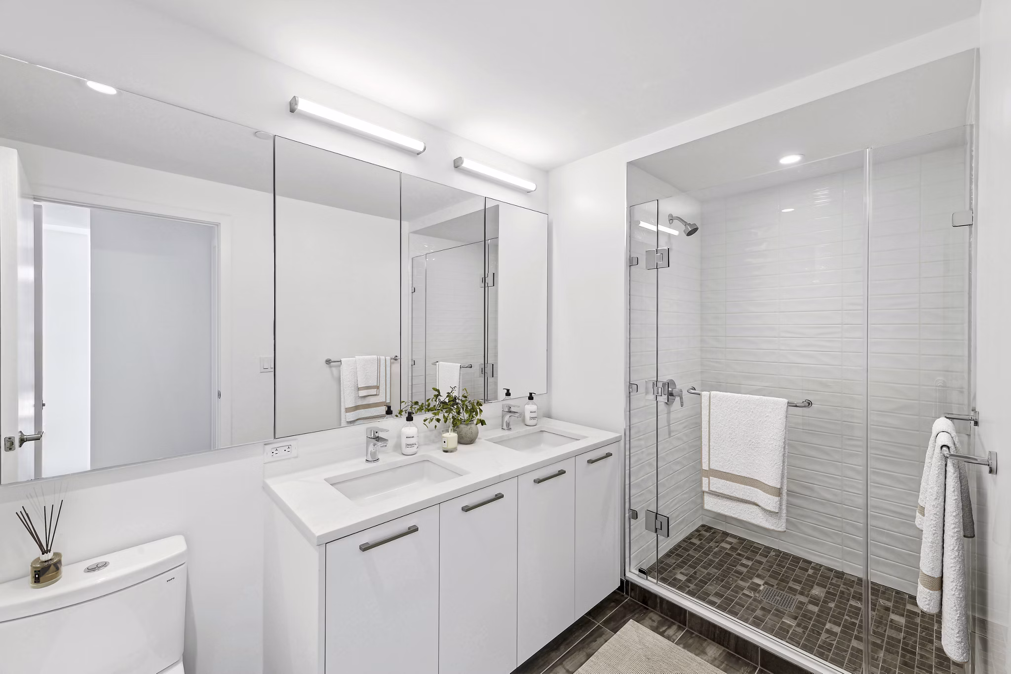 Elegant bathroom with modern fixtures at Crossing DC Apartments, a prime choice for those seeking luxury living in the heart of Washington, DC