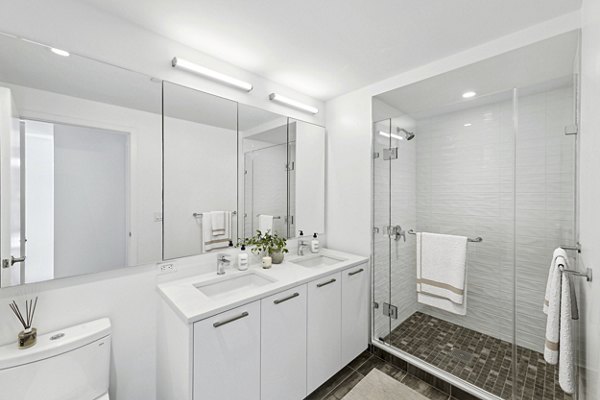 Elegant bathroom with modern fixtures at Crossing DC Apartments, a prime choice for those seeking luxury living in the heart of Washington, DC