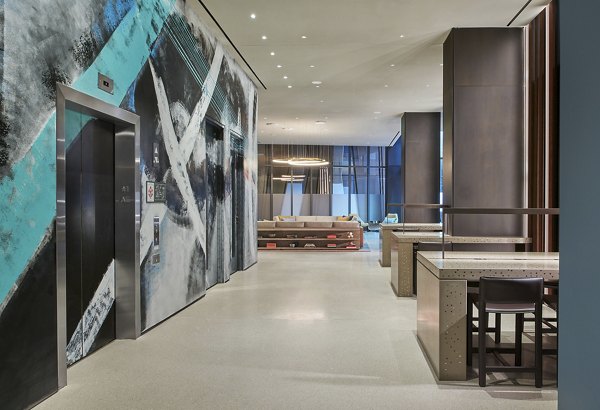 Clubhouse featuring luxurious seating and modern decor at Crossing DC Apartments, a prime example of Greystar luxury living in Washington, DC