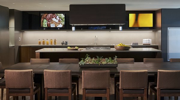 Clubhouse with modern design elements at Crossing DC Apartments, offering a luxury space for residents to socialize and relax