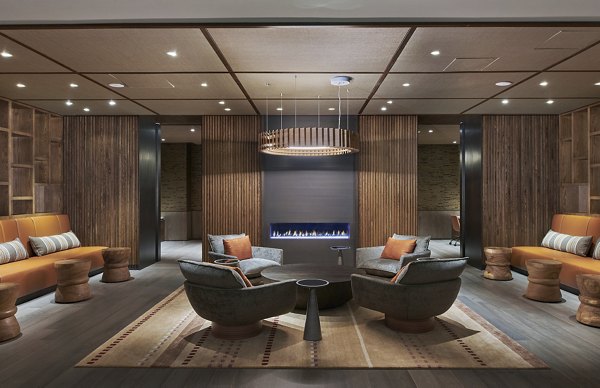 Clubhouse featuring modern lounge and co-working spaces at Crossing DC Apartments