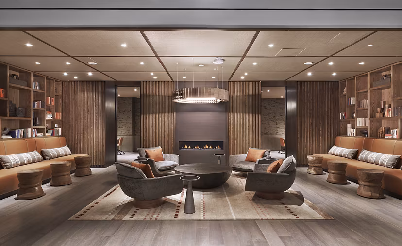 Modern clubhouse with sleek design at Crossing DC Apartments, offering luxury amenities and vibrant social spaces for residents