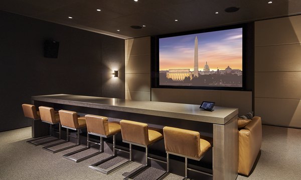 Clubhouse featuring stylish seating and modern design at Crossing DC Apartments