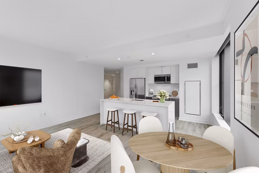 Dining area featuring modern decor and stylish lighting at Crossing DC Apartments