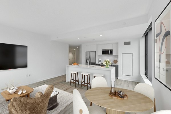 Dining area featuring modern decor and stylish lighting at Crossing DC Apartments