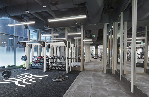 State-of-the-art fitness center with modern equipment at Crossing DC Apartments