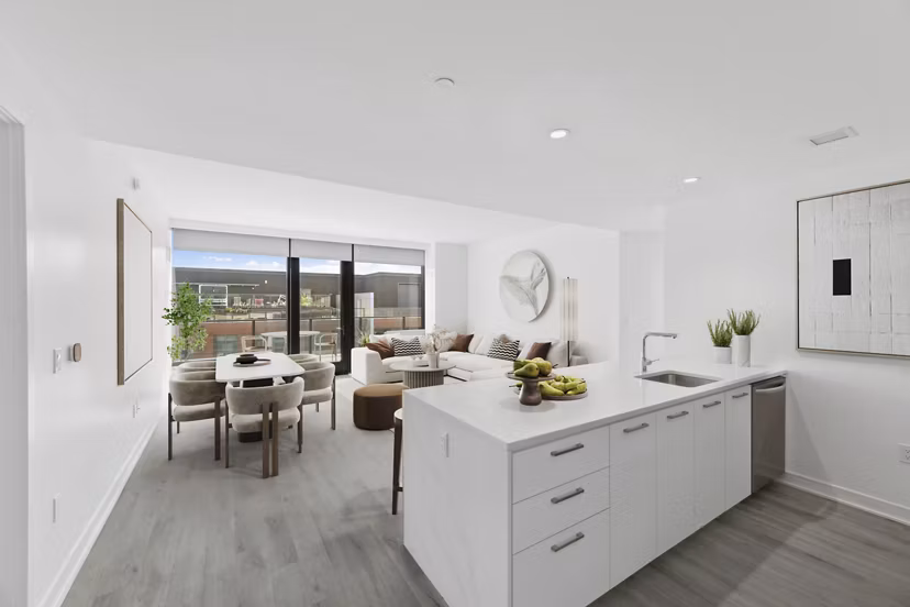 Spacious kitchen with modern appliances and granite countertops at Crossing DC Apartments