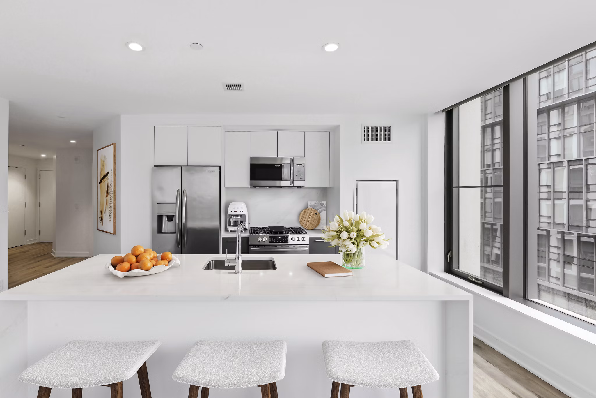 Modern kitchen with stainless steel appliances at Crossing DC Apartments