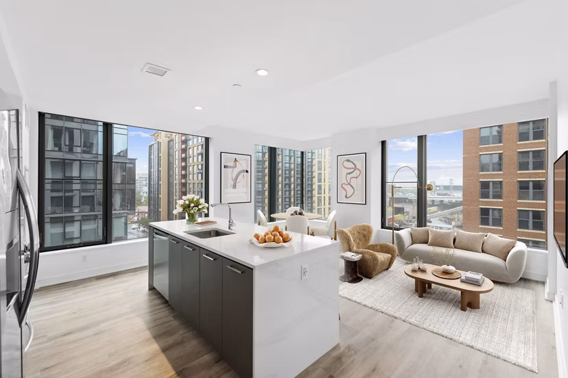 Modern kitchen with stainless steel appliances at Crossing DC Apartments