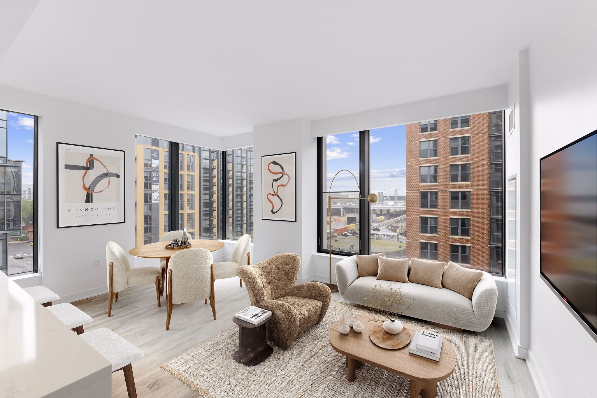 Cozy living room with modern decor at Crossing DC Apartments, featuring comfortable seating and stylish coffee table in vibrant Washington, DC