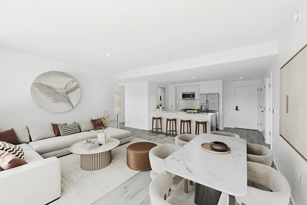 Spacious living room with modern decor at Crossing DC Apartments, featuring luxury seating and large windows