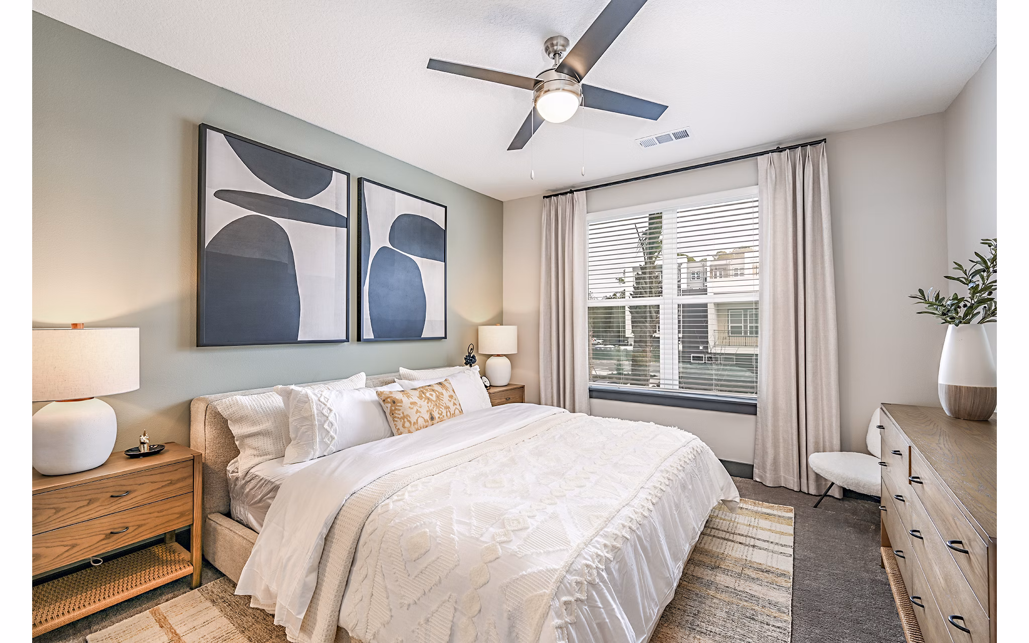 Bedroom with contemporary decor and ample natural light at Presidium Park Apartments