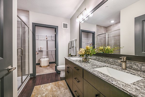 Elegant bathroom with modern fixtures at Presidium Park Apartments