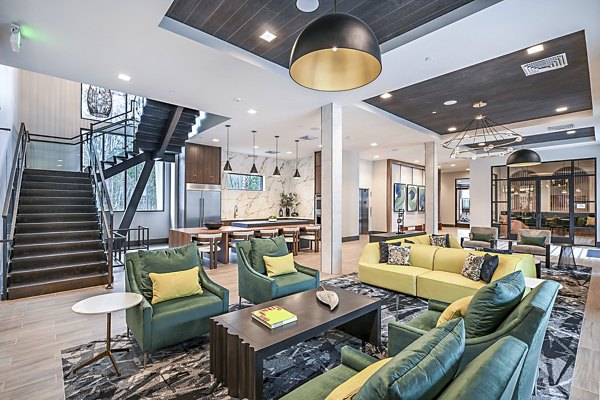 Clubhouse with modern decor at Presidium Park Apartments, offering luxury living spaces