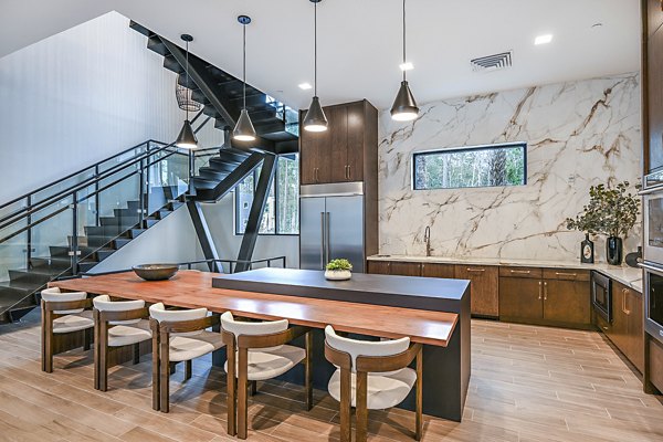 Clubhouse with modern design and seating at Presidium Park Apartments
