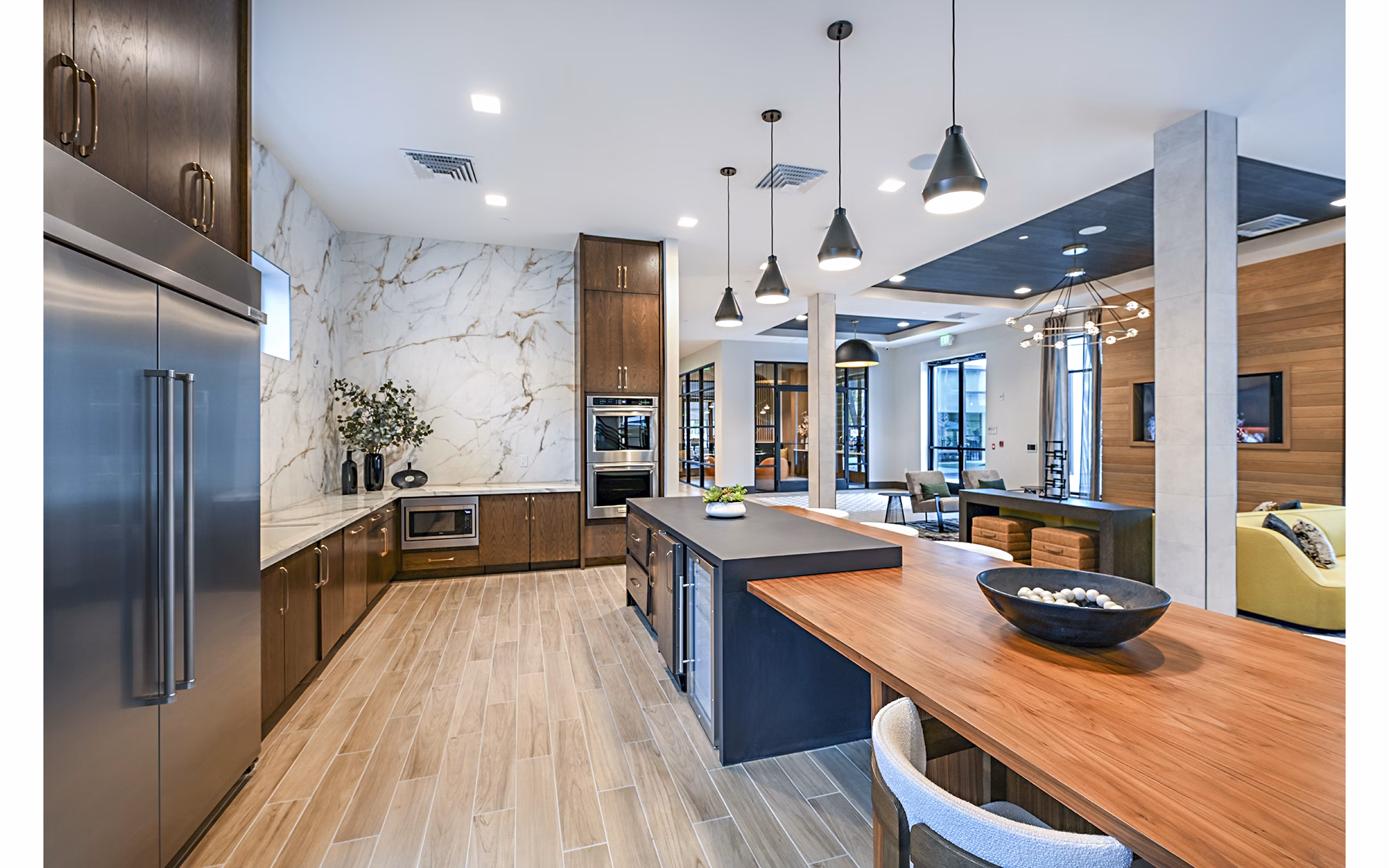 Clubhouse with modern decor and seating areas at Presidium Park Apartments, luxury living offered by Greystar