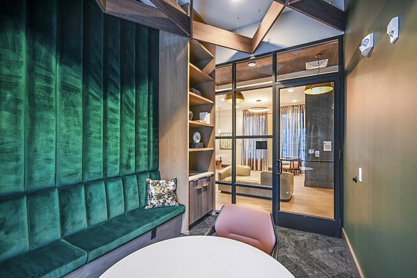 Clubhouse meeting facility with modern design at Presidium Park Apartments, ideal for gatherings and events