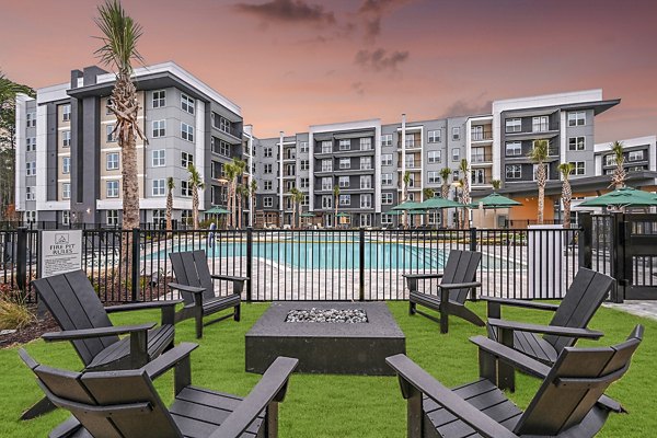 Intimate fire pit patio at Presidium Park Apartments ideal for gatherings and leisure