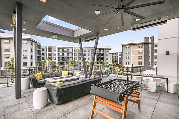 Cozy fire pit patio at Presidium Park Apartments