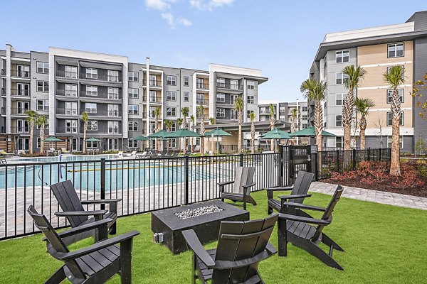 Cozy fire pit on patio at Presidium Park Apartments, luxury living in a serene setting