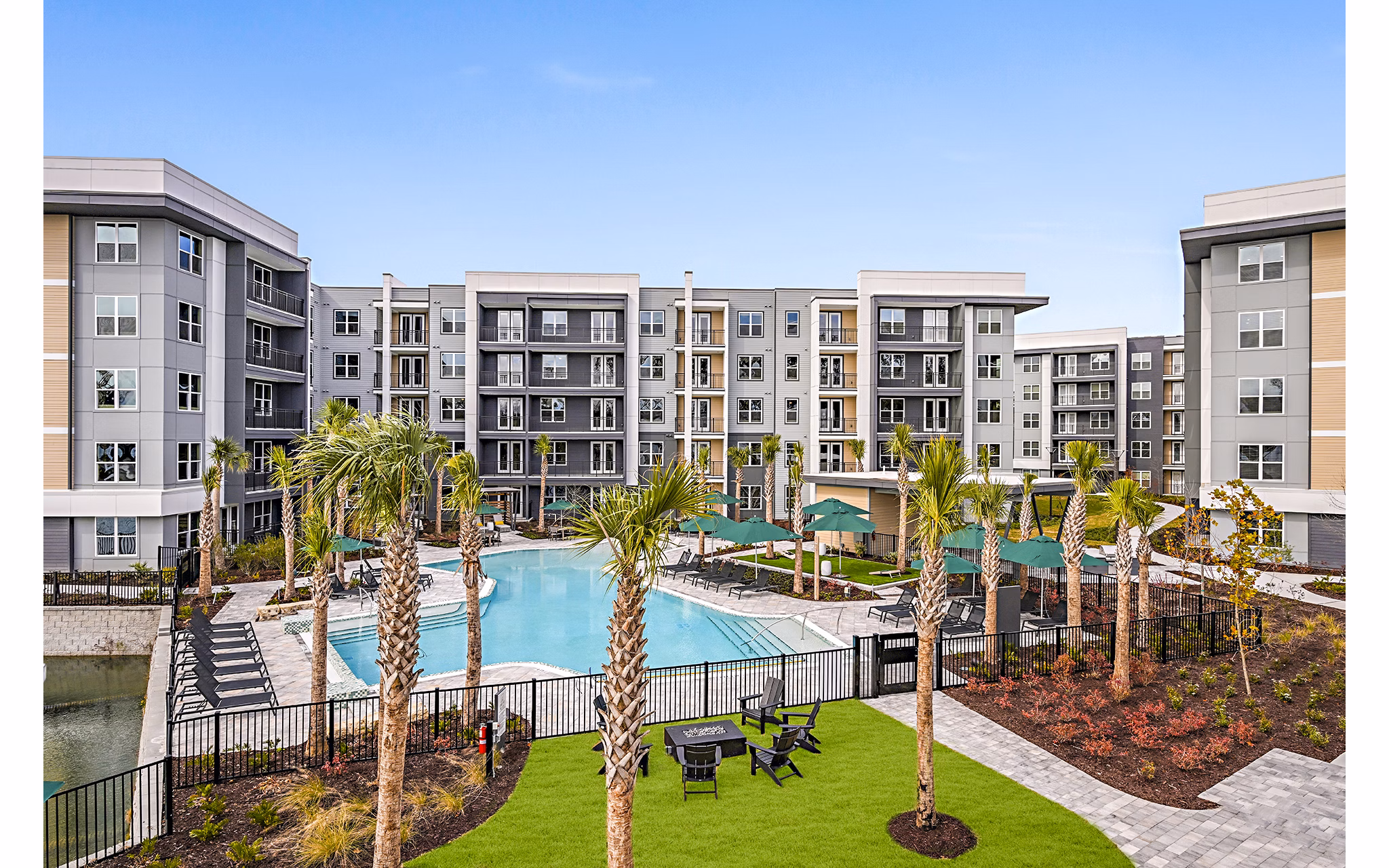 Tranquil outdoor pool area at Presidium Park Apartments, perfect for relaxation and recreation in a luxury living environment