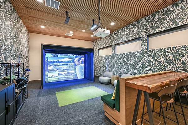 Virtual golf driving range at Presidium Park Apartments featuring state-of-the-art technology for practicing swings indoors
